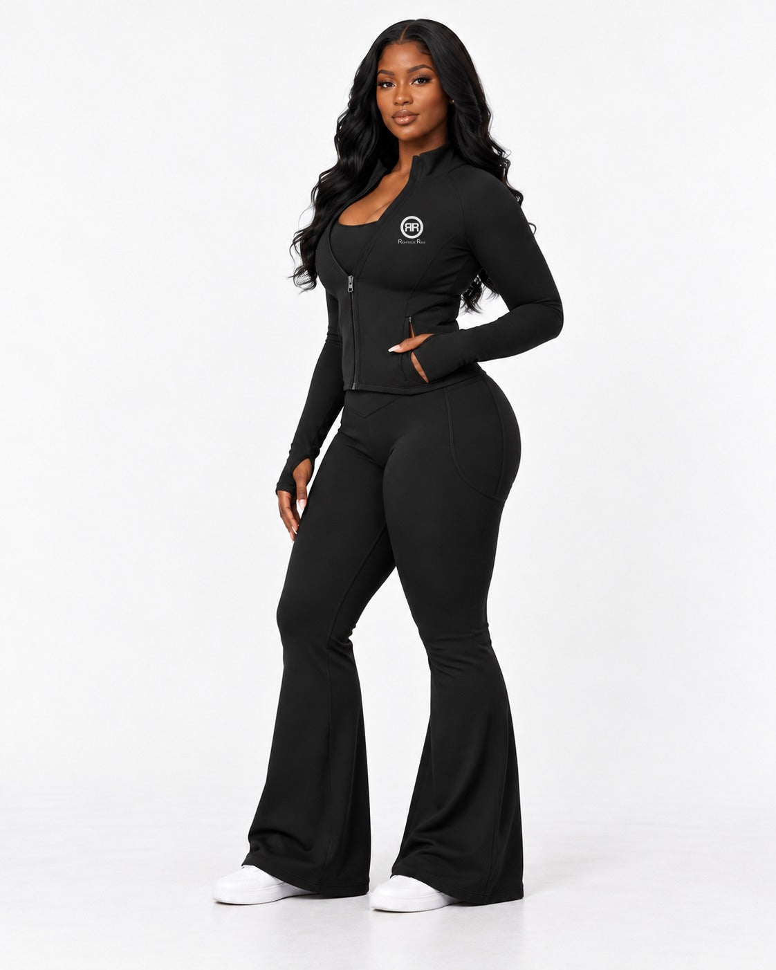 The Standard Flare Legging and Jacket set in Black, full-length side view showing the flare
